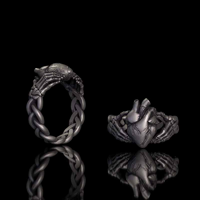 Gothic Skull Hands Holding Heart Sterling Silver Ring 01 | RoyalLuster.com