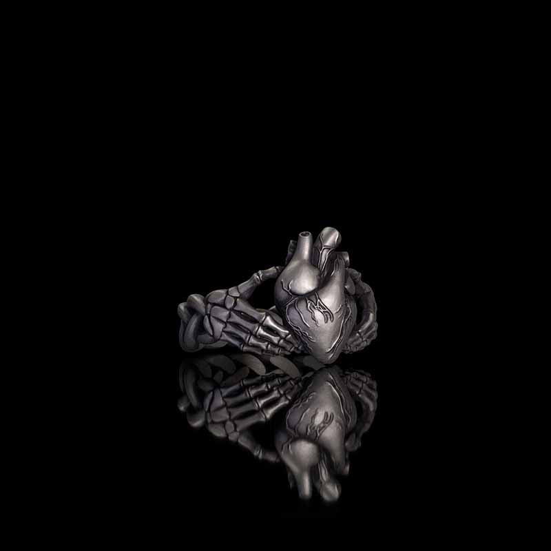 Gothic Skull Hands Holding Heart Sterling Silver Ring 02 | RoyalLuster.com