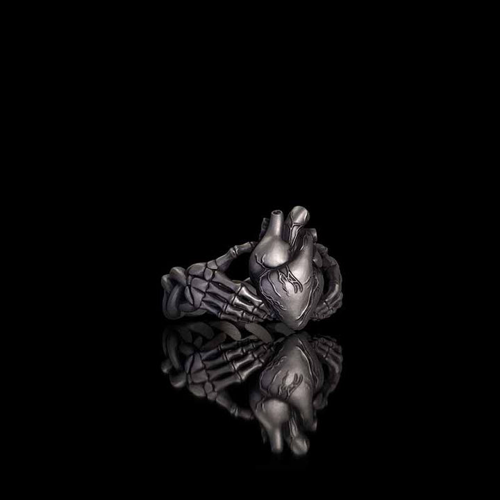Gothic Skull Hands Holding Heart Sterling Silver Ring 02 | RoyalLuster.com
