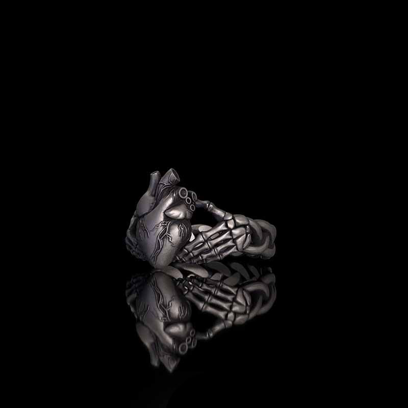 Gothic Skull Hands Holding Heart Sterling Silver Ring